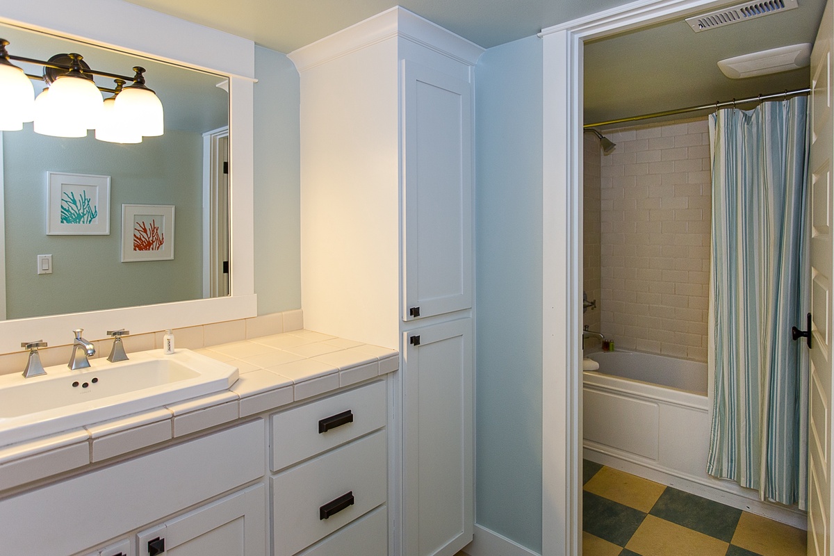 Full bathroom with shower and tub combination