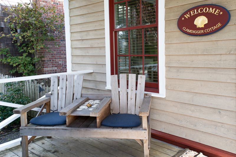 Relax on the spacious front porch in a rocking chair and visit with neighbors