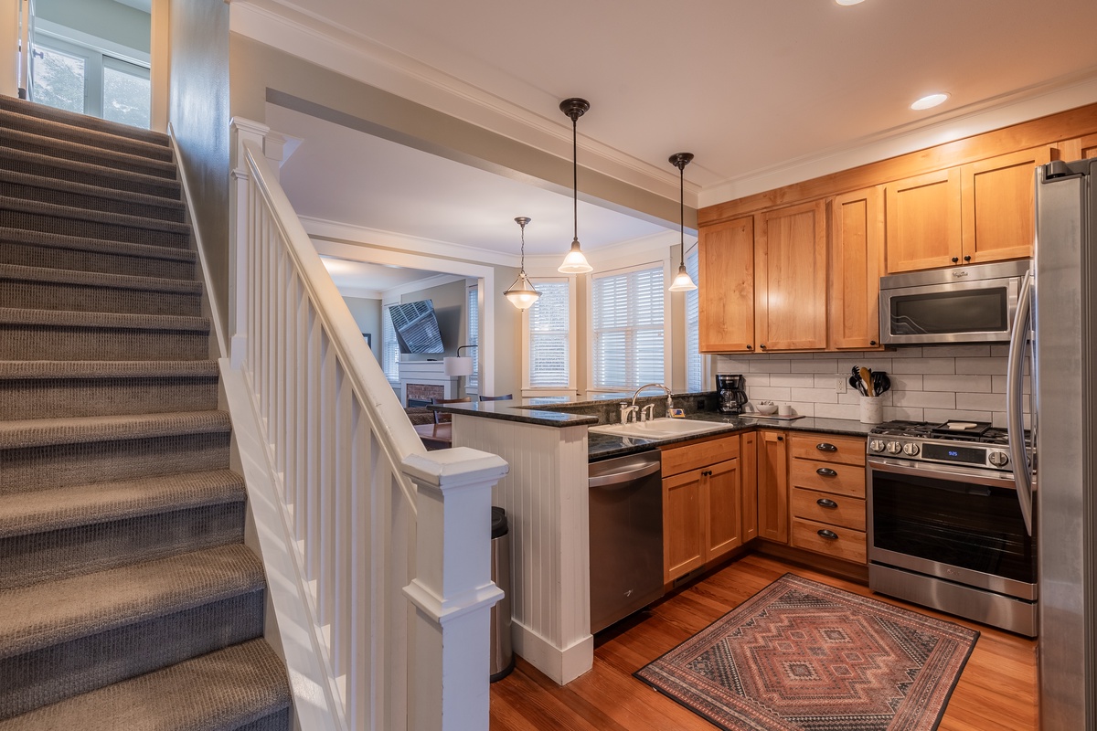 The stairway creates a warm welcome to every level of your stay