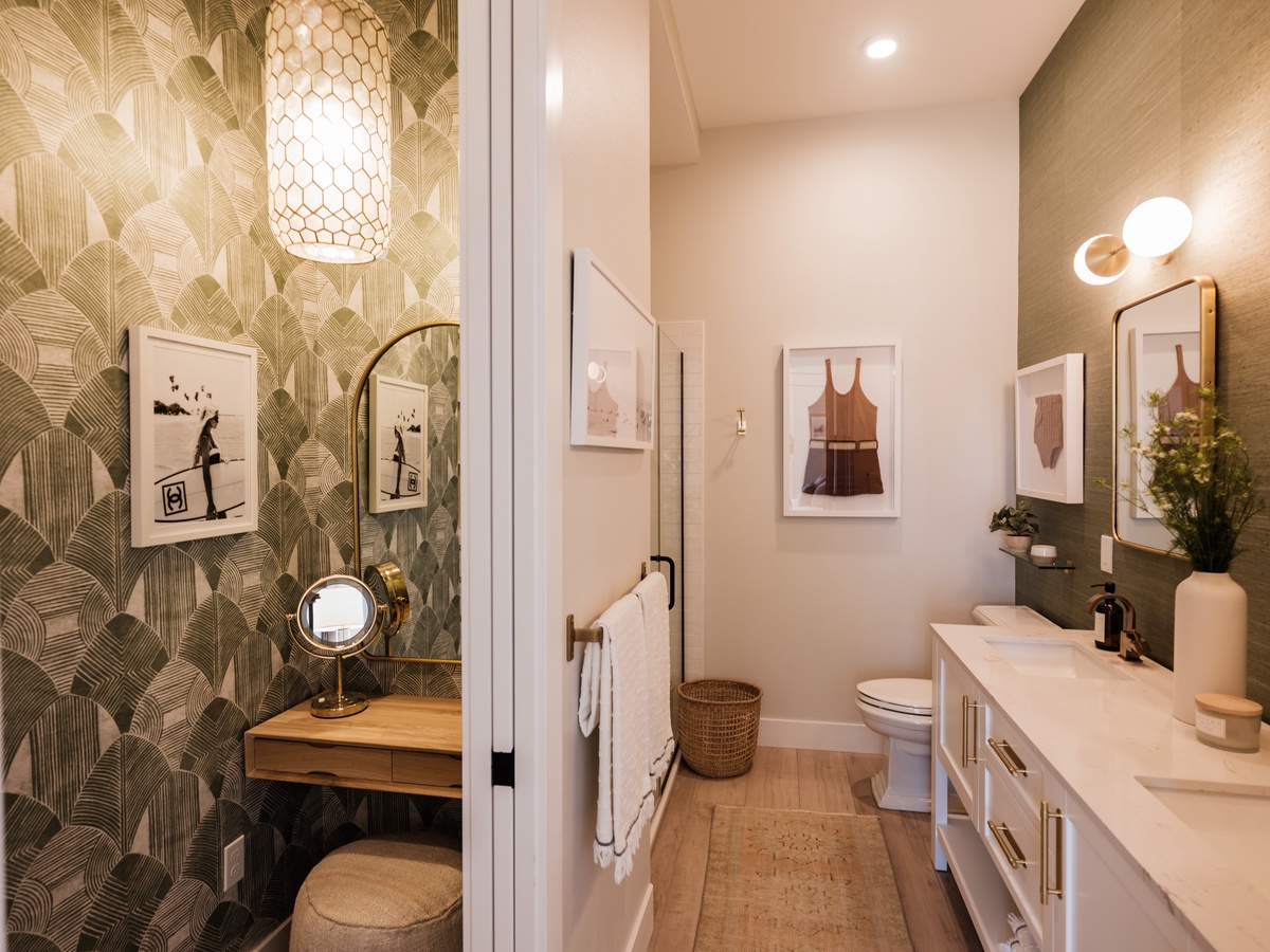 The Beach Loft Primary Bath with Closet and Vanity