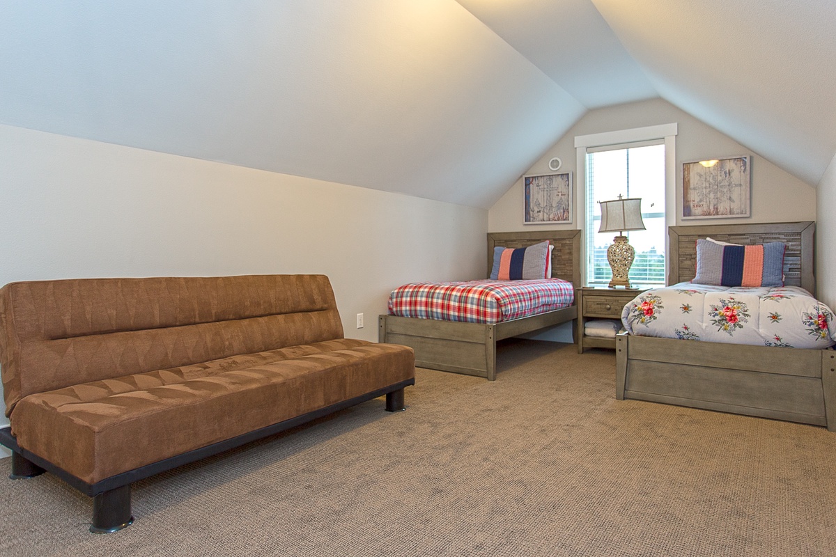 Sofa and beds in loft