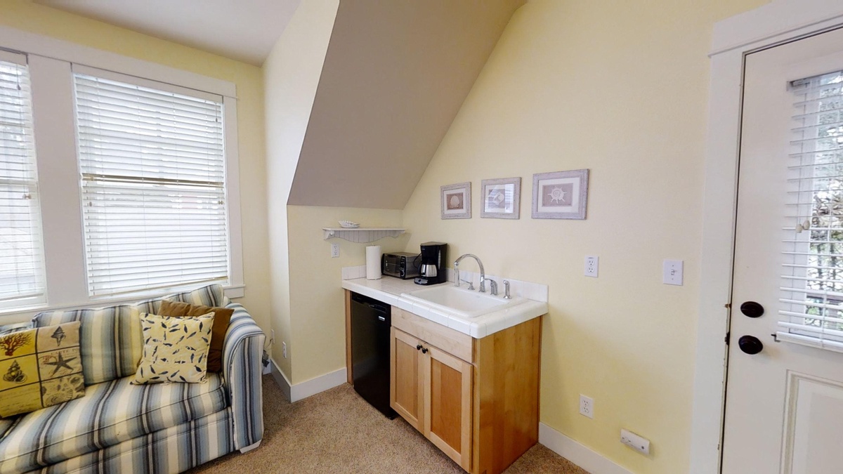 The kitchenette is perfect for quick meals and cozy mornings
