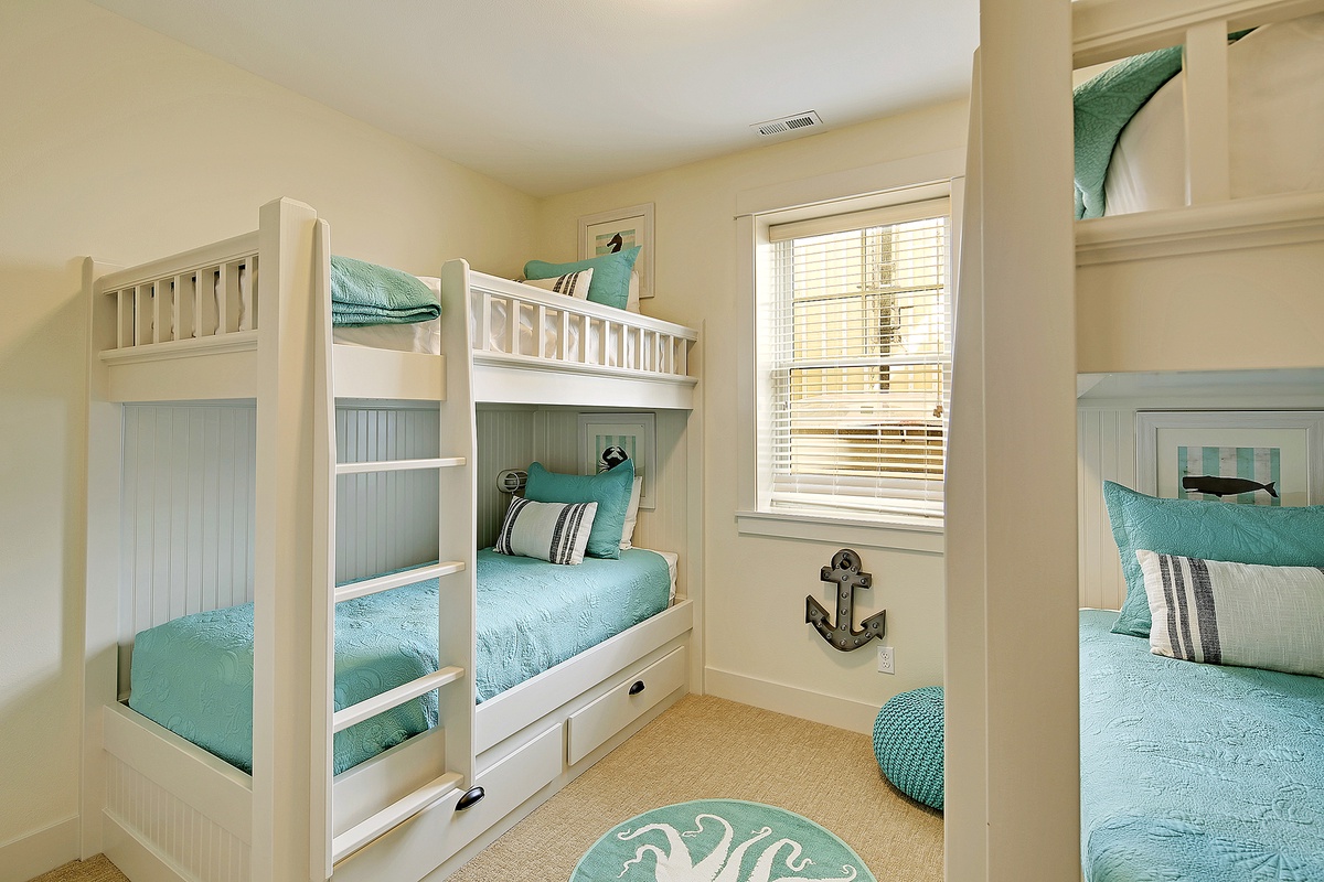 Downstairs bunk room with four twins