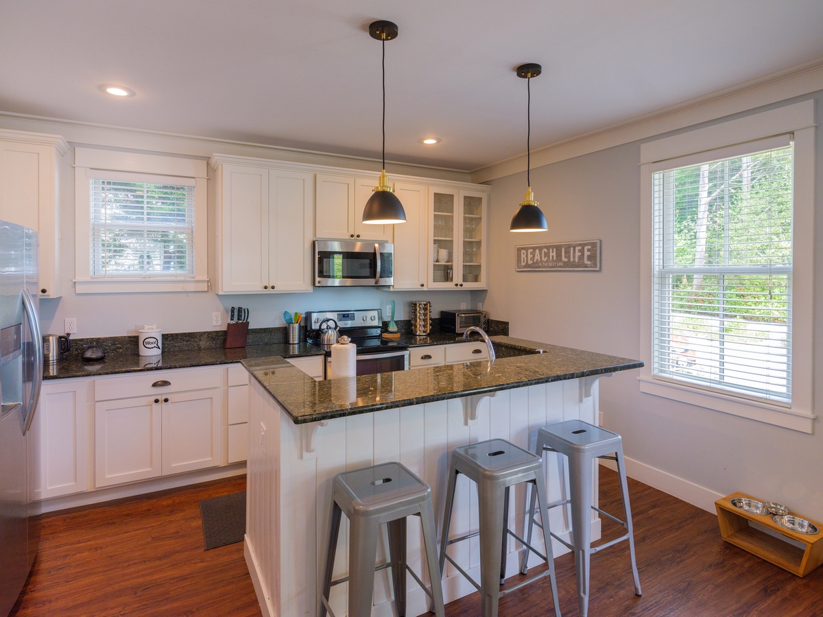 The fully equipped kitchen is designed for effortless meals