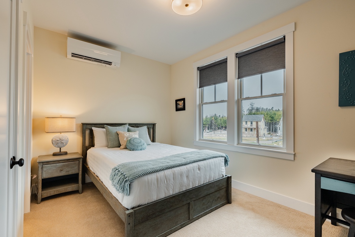 Upstairs queen bedroom - your private retreat awaits