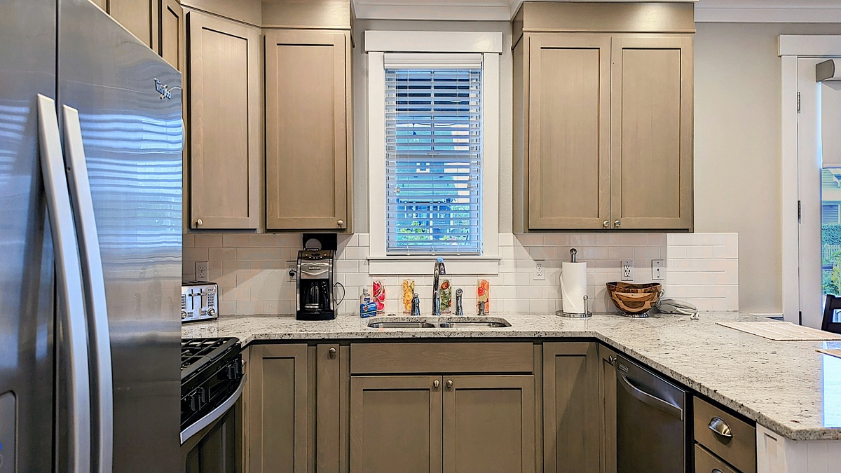 The kitchen counter has seating for two