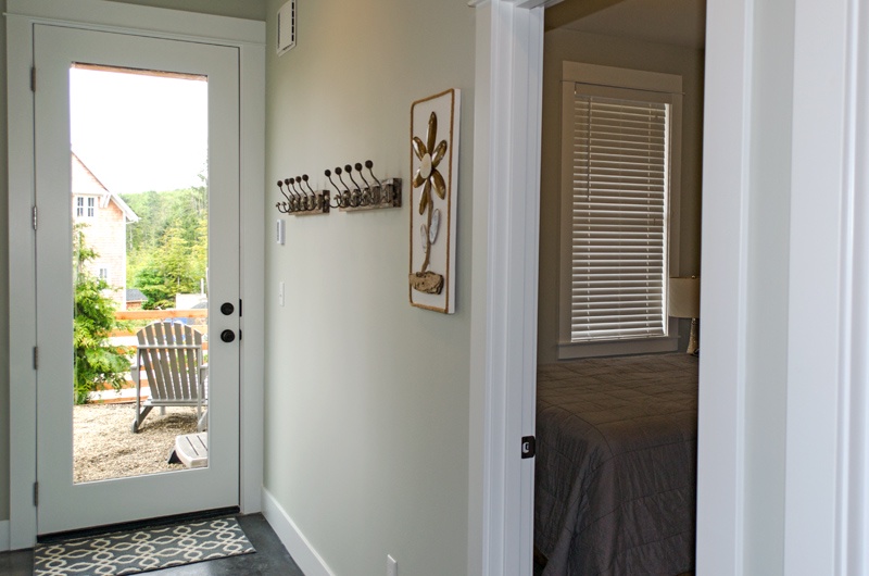 Lower Level - Guest bedroom and door to patio and hot tub