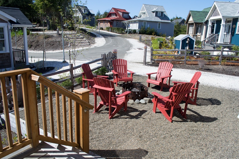 Fire pit and Adirondack chairs