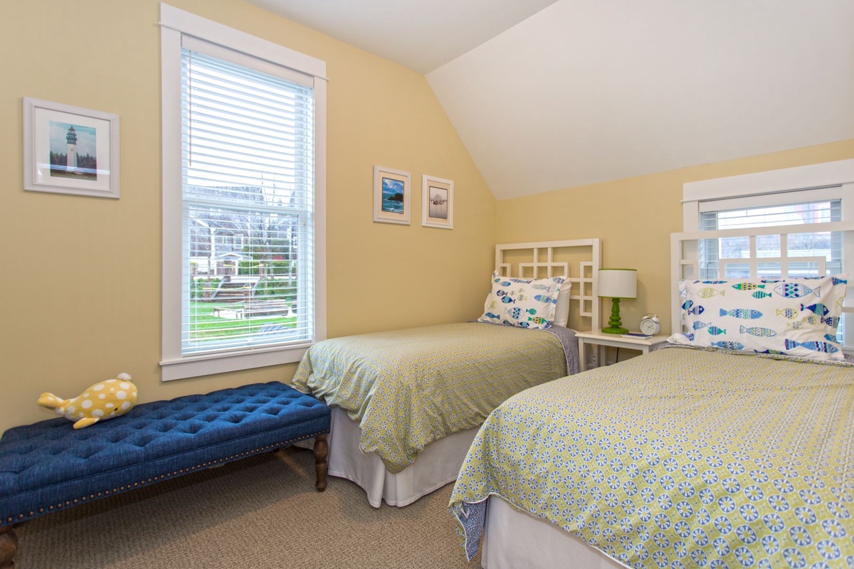 Two twin beds with park views