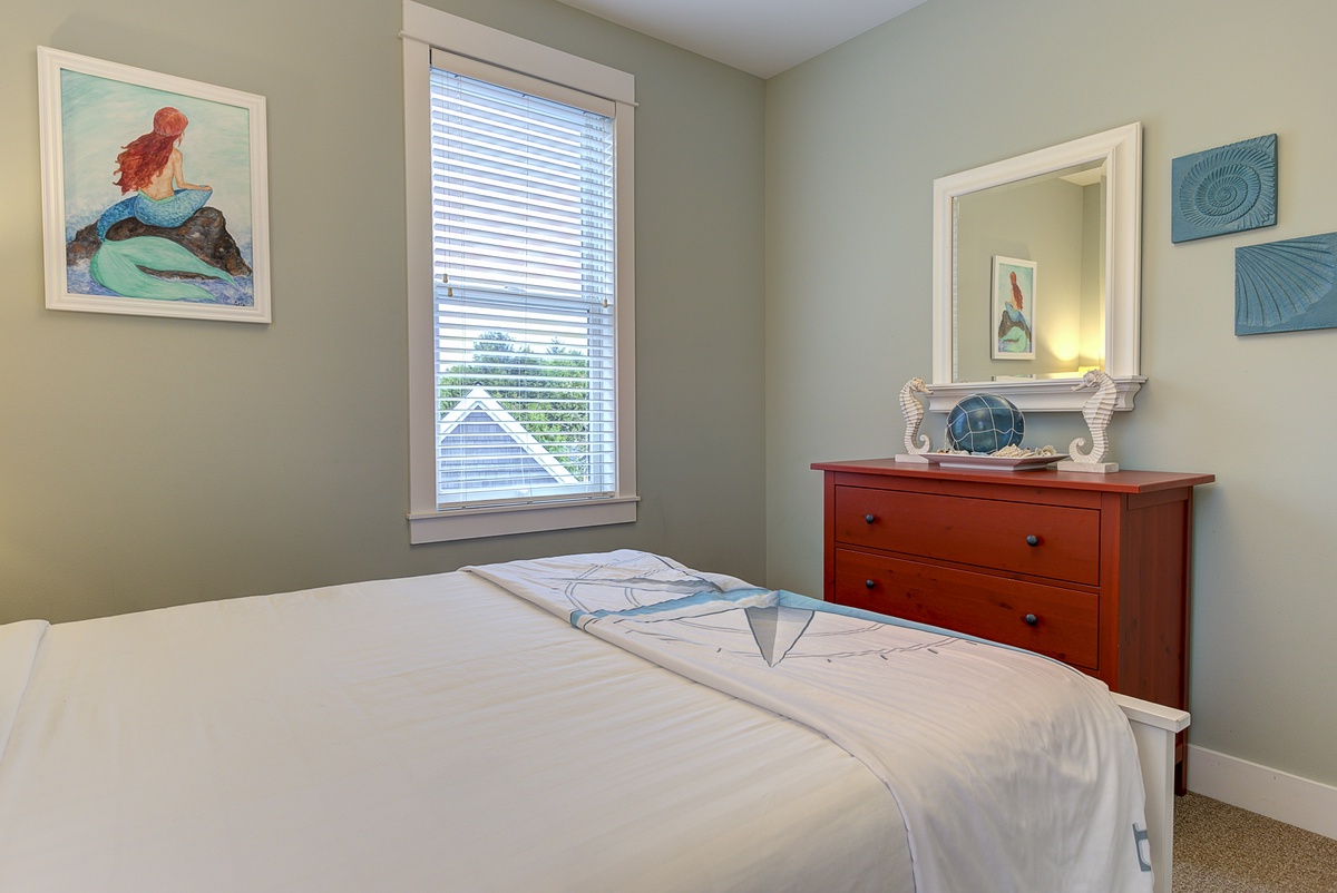 Peaceful guest bedroom with ample light