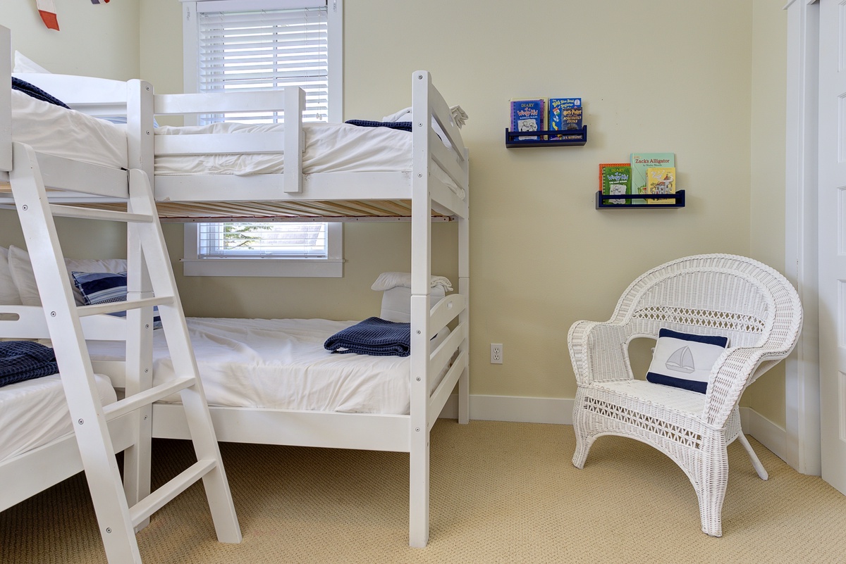 The bunk bedroom is stocked with kids' books