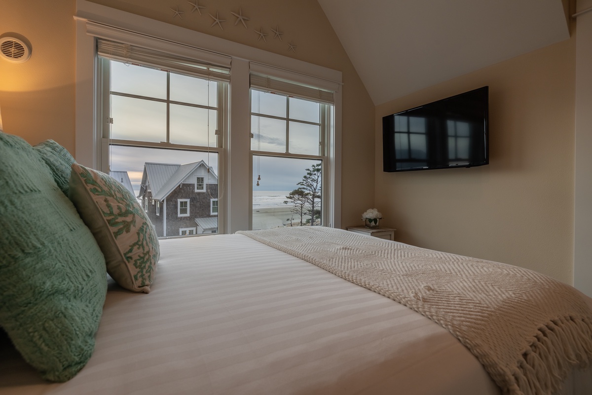 Primary bedroom with beach view