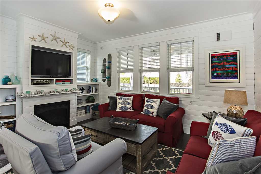 Living room with gas fireplace and TV