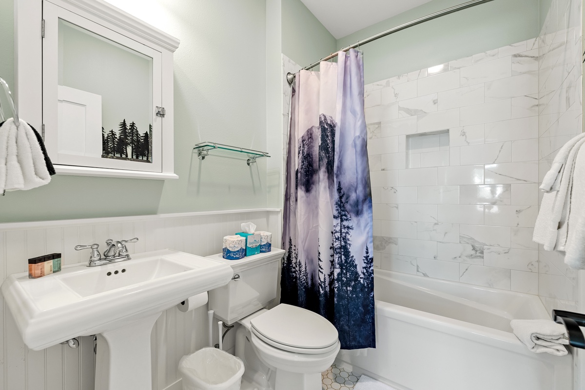 The full guest shared bathroom is designed for comfort and ease during your stay