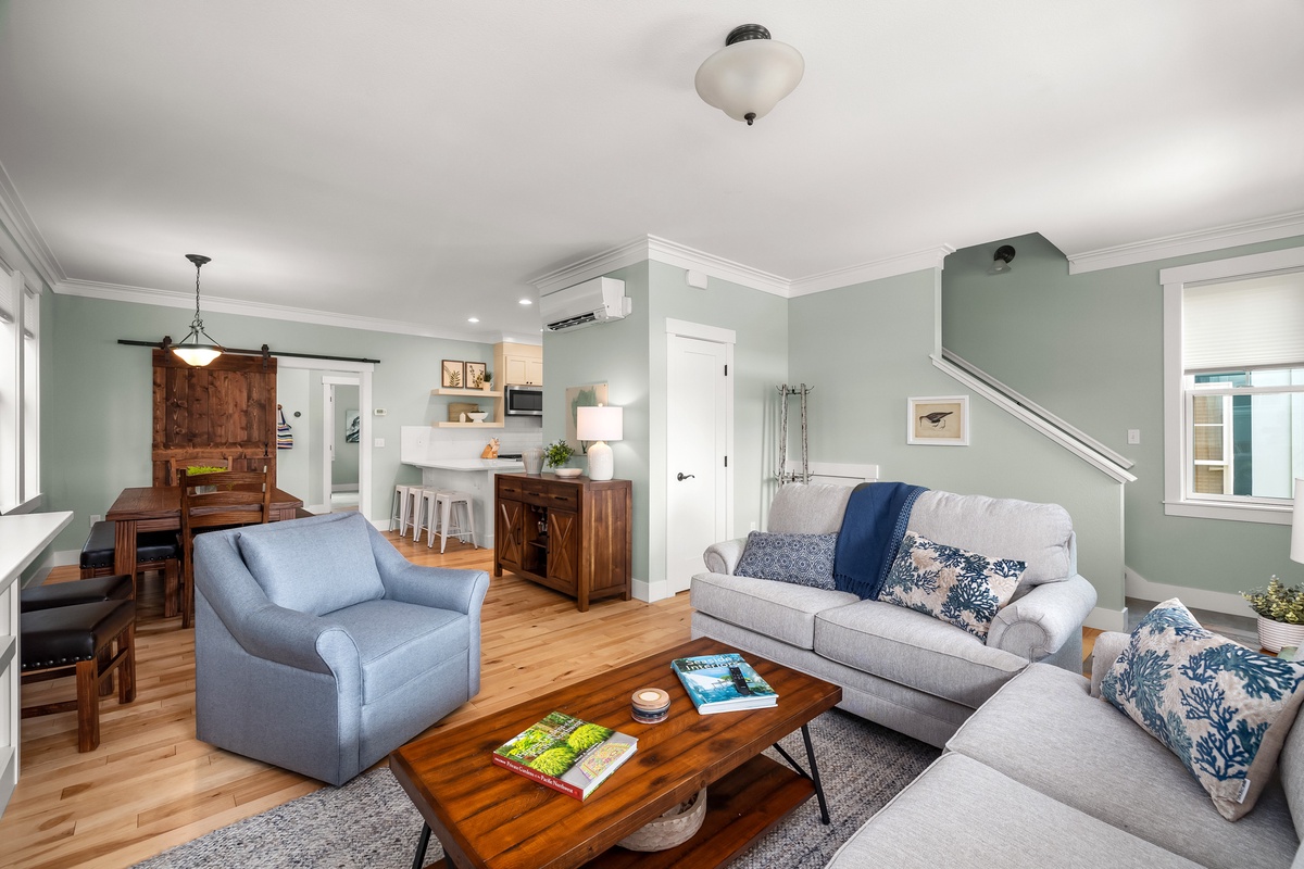 The living room offers comfort and convenience for a relaxing stay