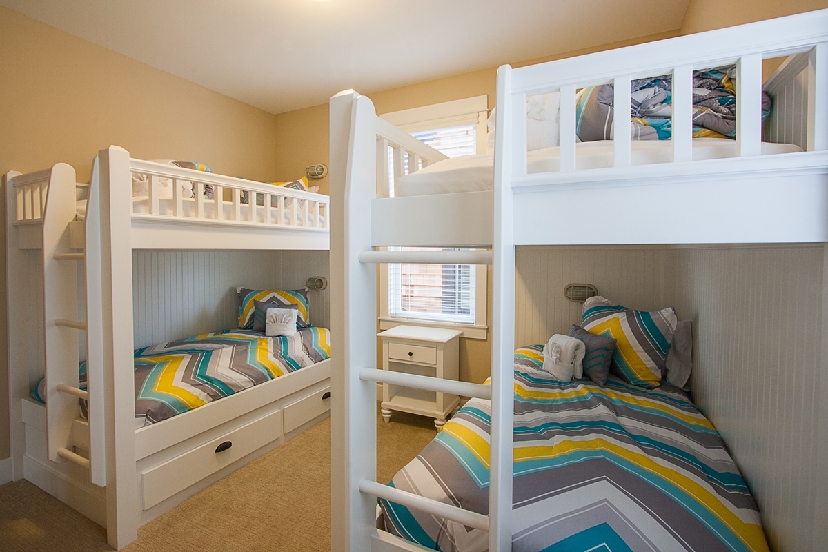 Bunk bedroom on second floor with TV