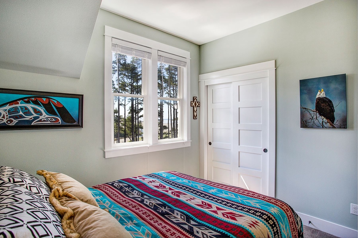 Queen bedroom with ocean view