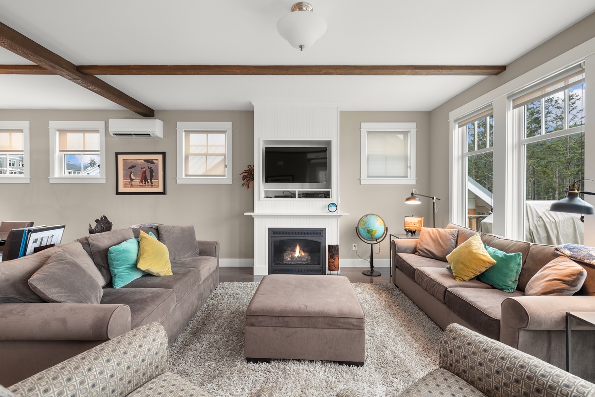 Curl up in front of the cozy gas fireplace