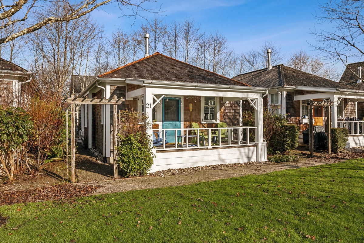 Covered front porch with park views