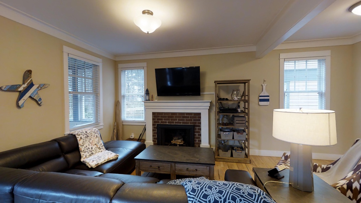 Wood burning fireplace and flat screen tv