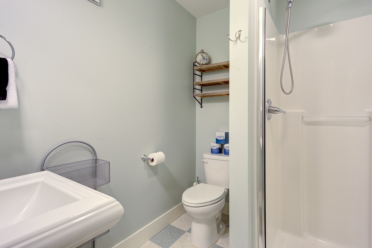 Downstairs shared bathroom is conveniently located for easy mornings