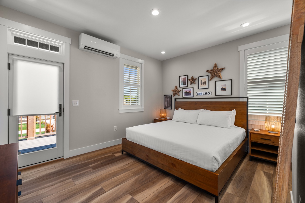 Primary king bedroom with deck