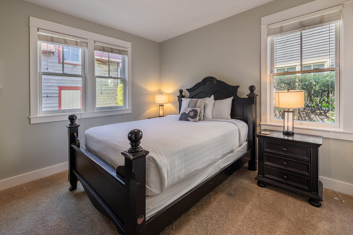 The main floor king bedroom is the perfect place to unwind