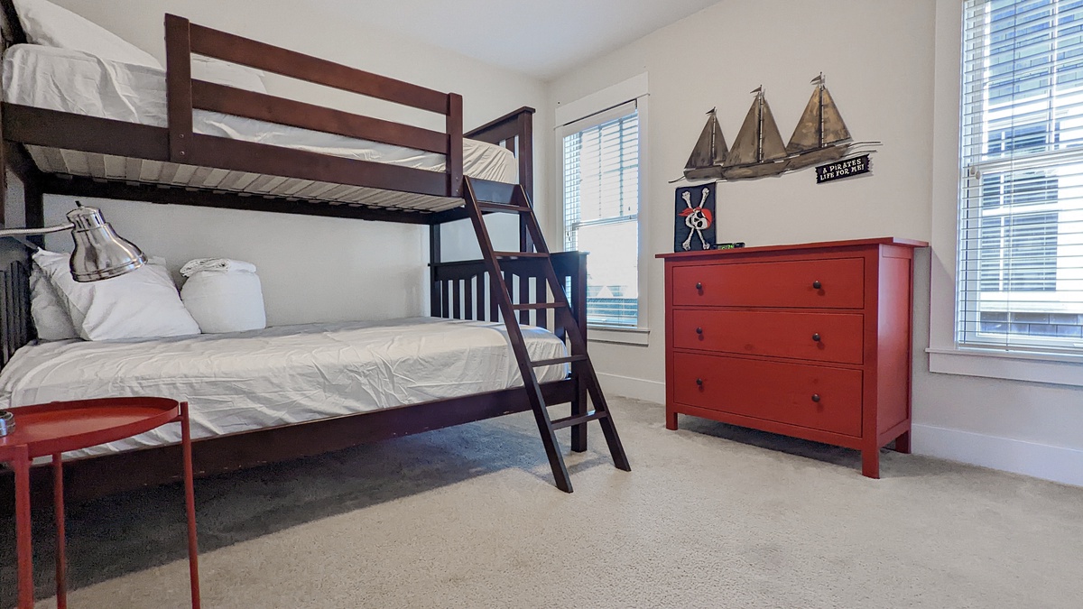 Bunk bedroom with a twin over queen bunk