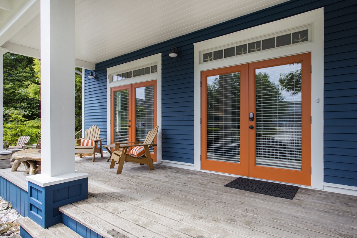 Enjoy the outdoors, regardless of the weather, on the covered front porch