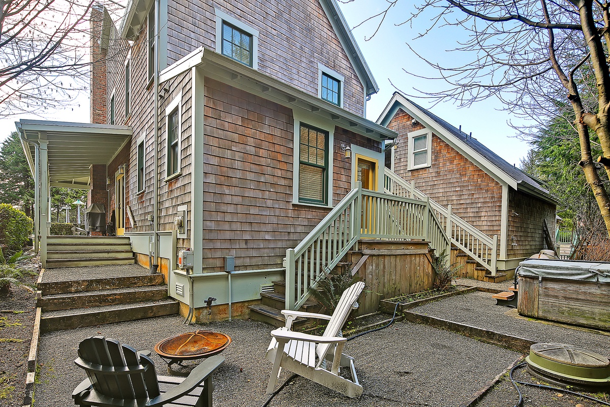 Back patio with fire pit and hot tub