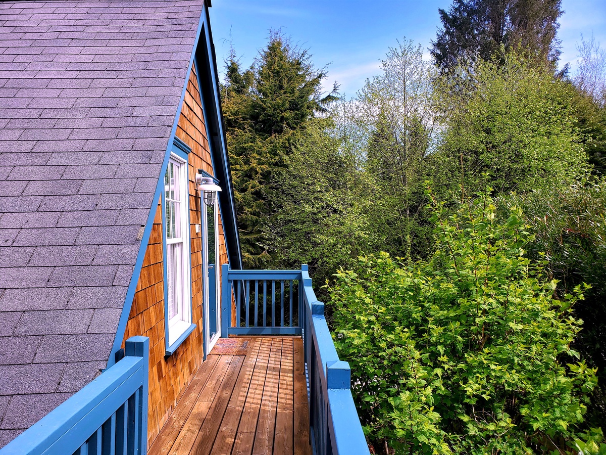 Carriage house is uniquely located on the main deck level for easy, convenient access