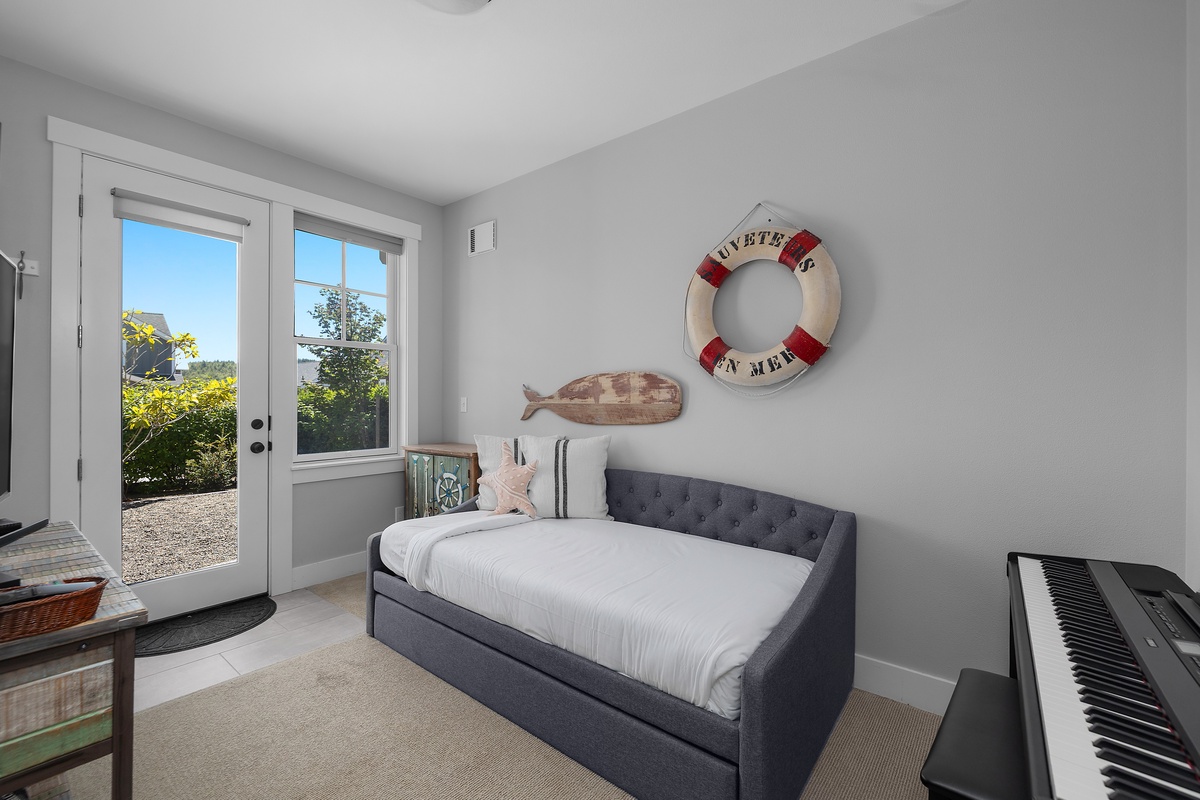 Media room with twin trundle bed