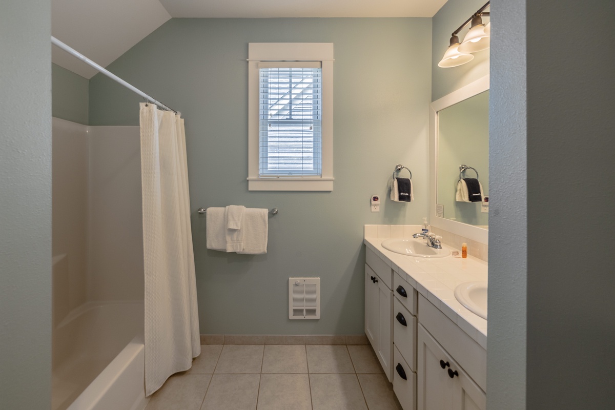 Second floor primary ensuite bathroom offers a spa-like retreat