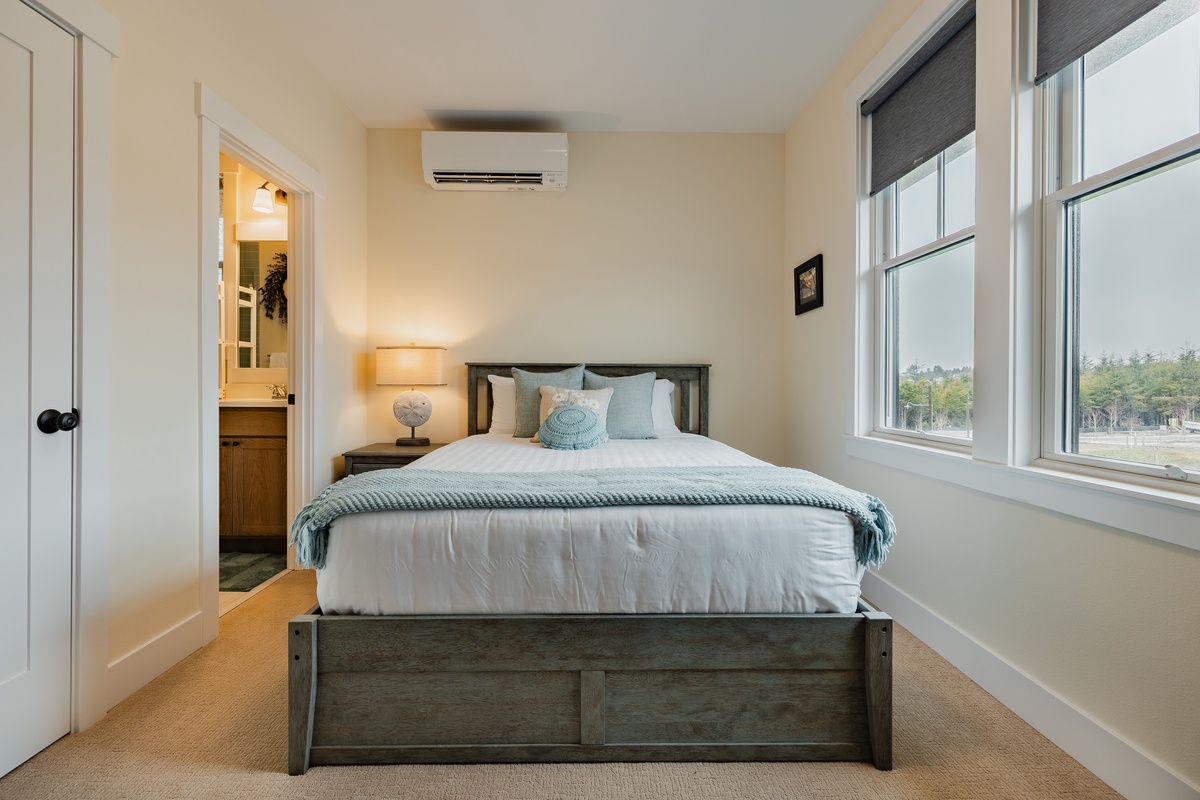 Queen bedroom has an ensuite bath for a restful and refreshing stay