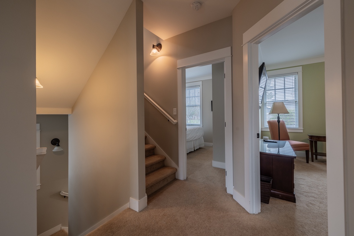 Hallway and stairs up to loft