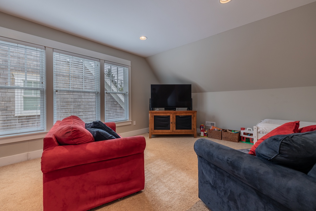 Cozy loft with TV and chairs