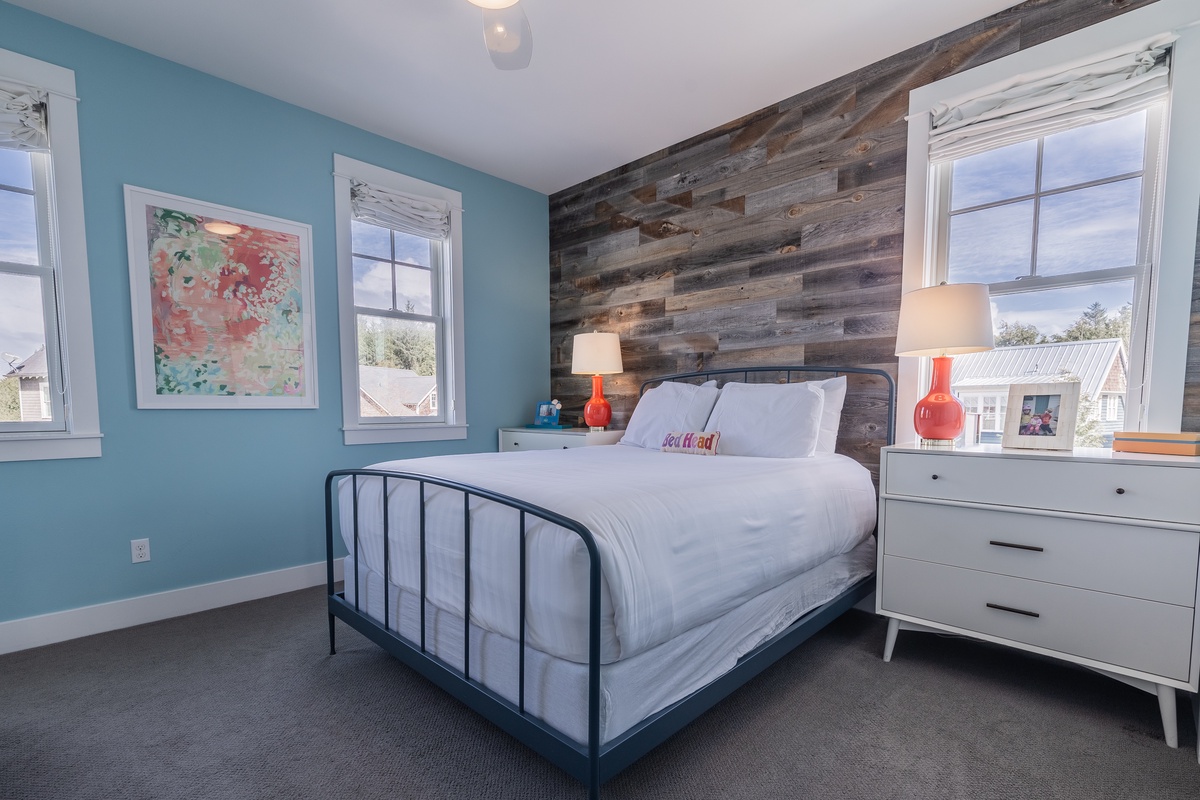 The primary bedroom offers comfort, style, and relaxation