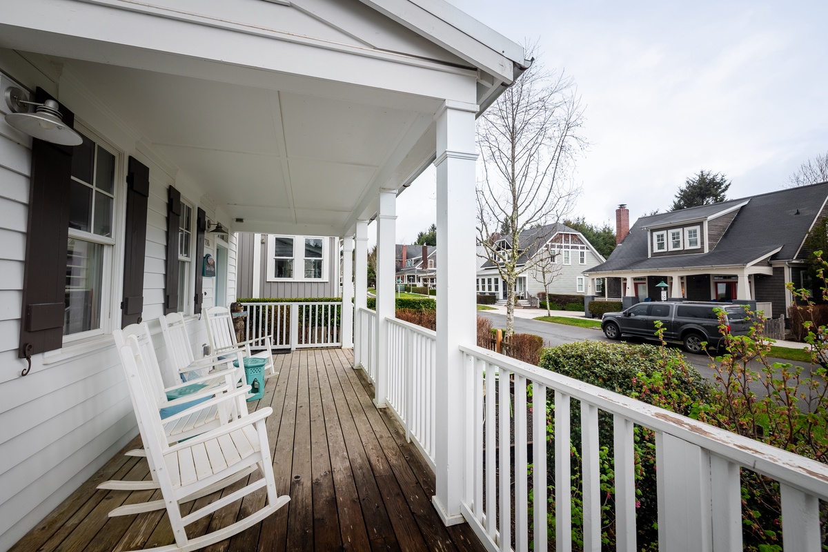 Rocking chairs on the front porch for you to relax in