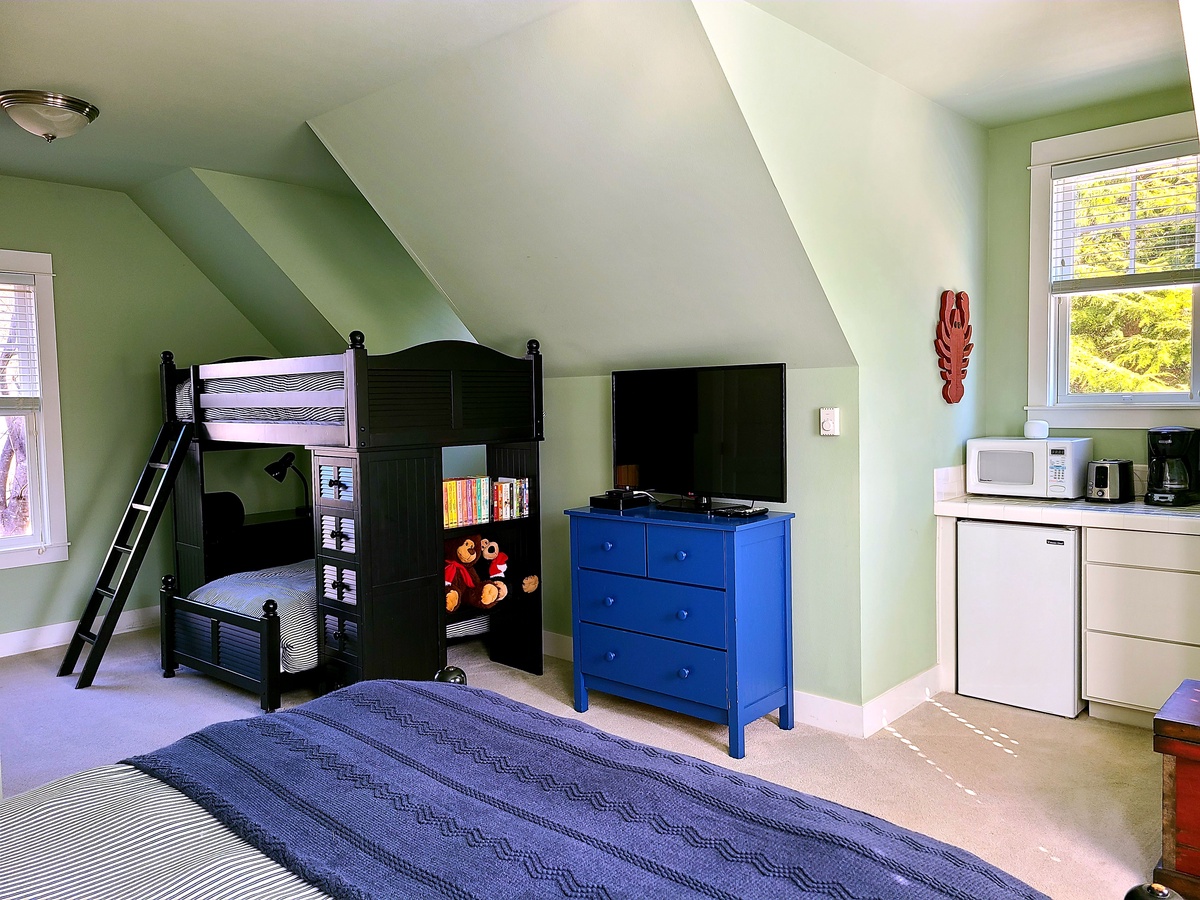 Carriage House features family friendly accommodations with full bath, storage bunk bed and desk for the little ones