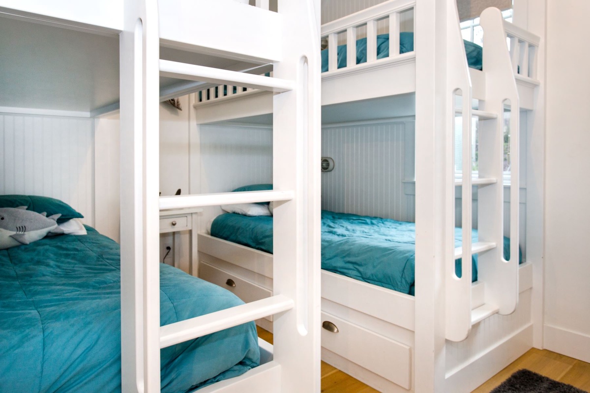 Two sets of bunk beds in bunk room
