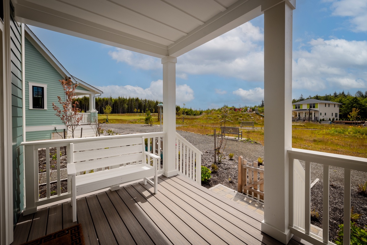 Covered front porch facing the park