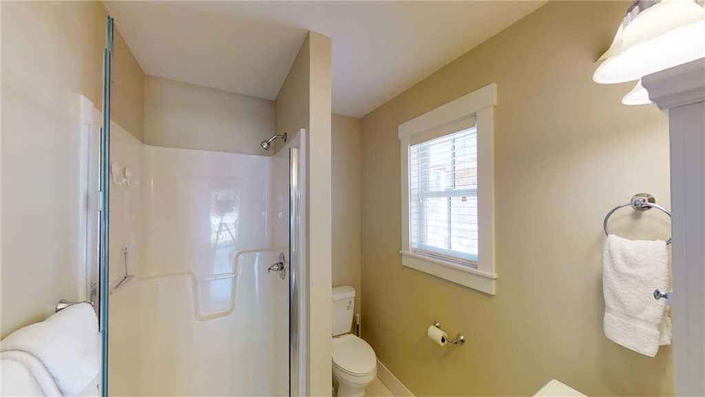 Shared full bathroom with shower