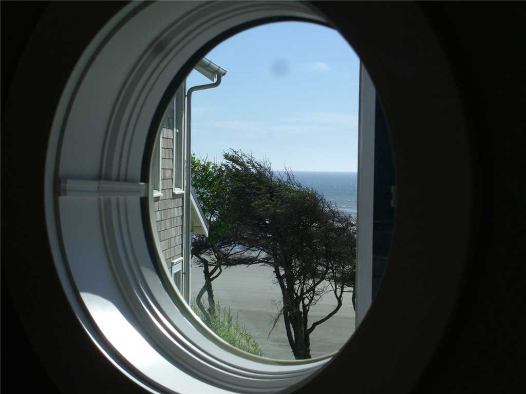 You can enjoy peekaboo views of the ocean and your walk on the beach is about a minute away
