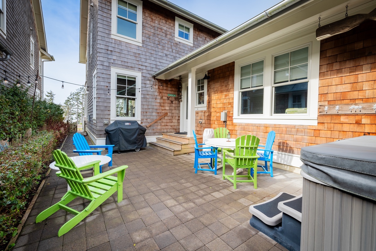 Hot tub, gas grill, and outdoor seating