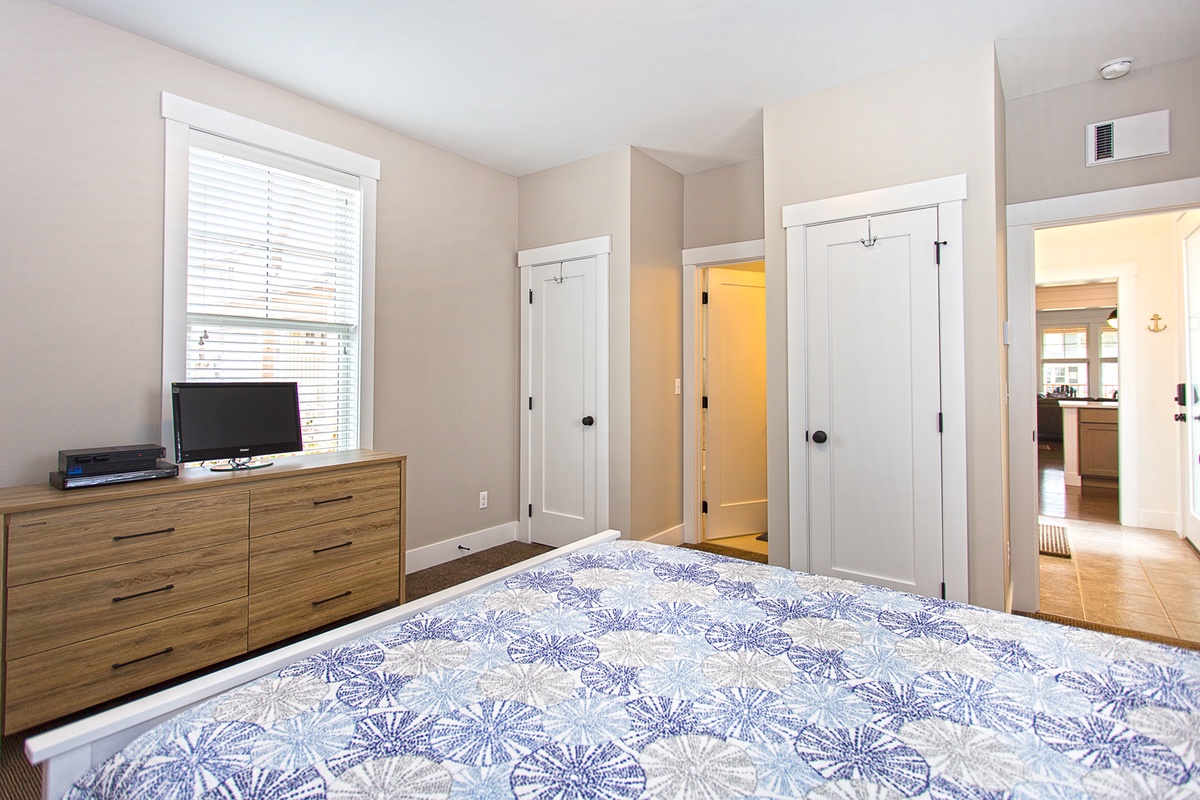 Main floor Queen Primary Bedroom with five piece primary bath