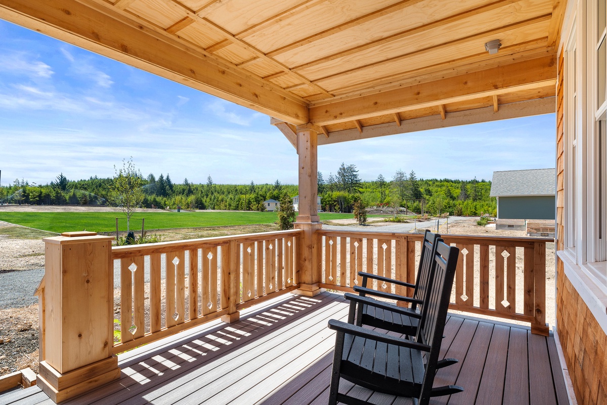 Covered front porch facing Meadowview Park