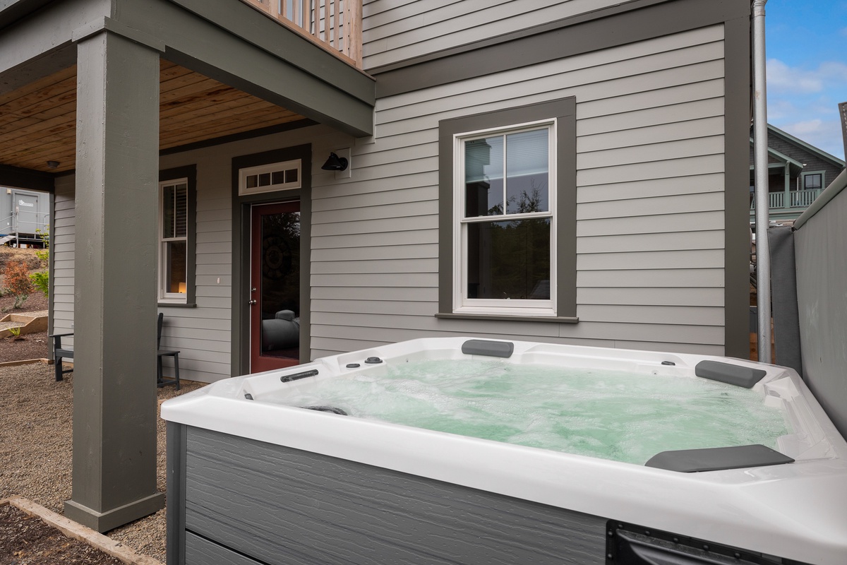 Take a dip in the hot tub just outside the back door