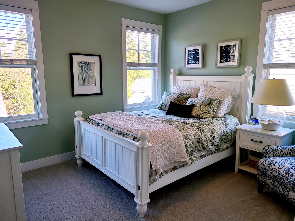 Large 2nd bedroom overlooks the backyard and lush forest greenbelt