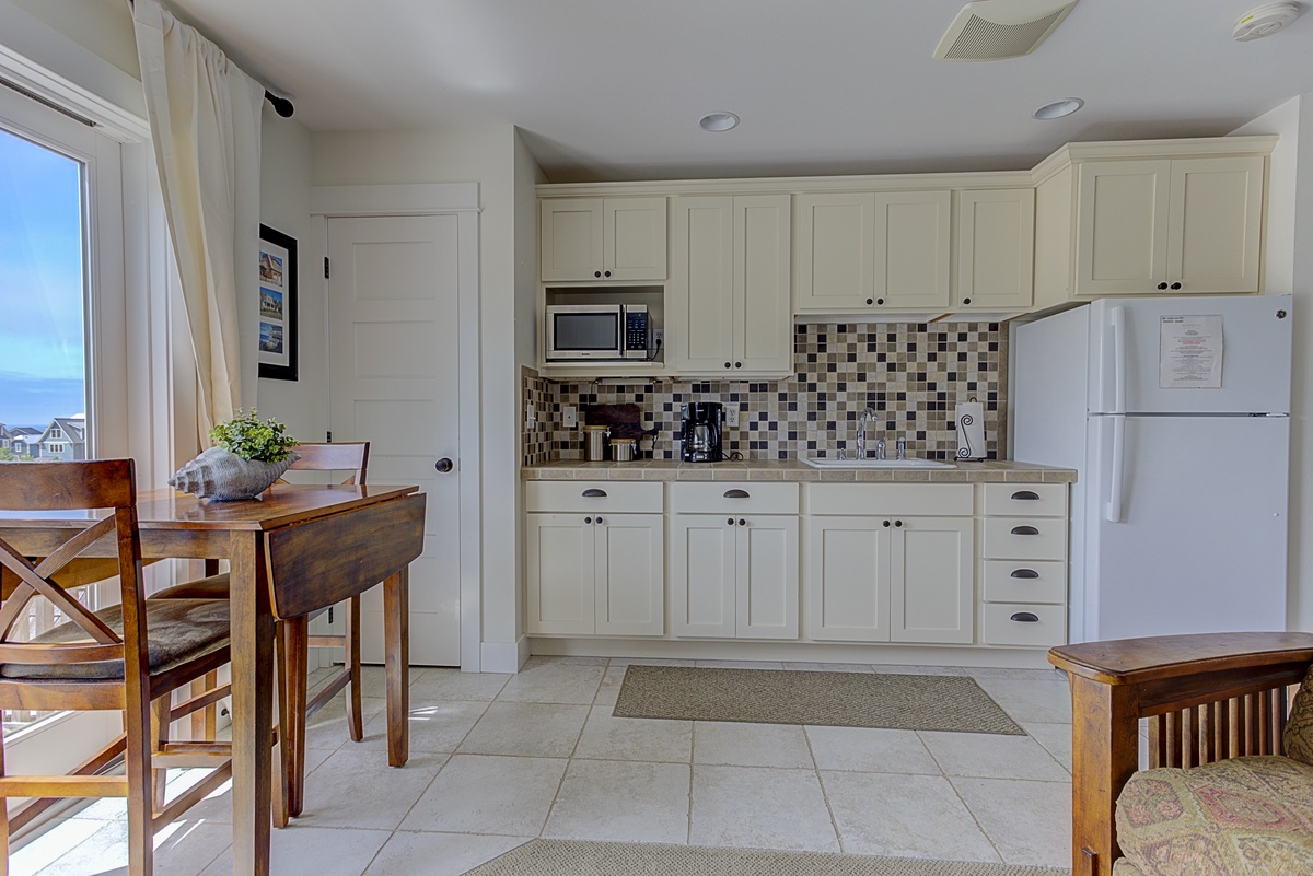 This carriage house kitchenette has everything you need for a delightful stay