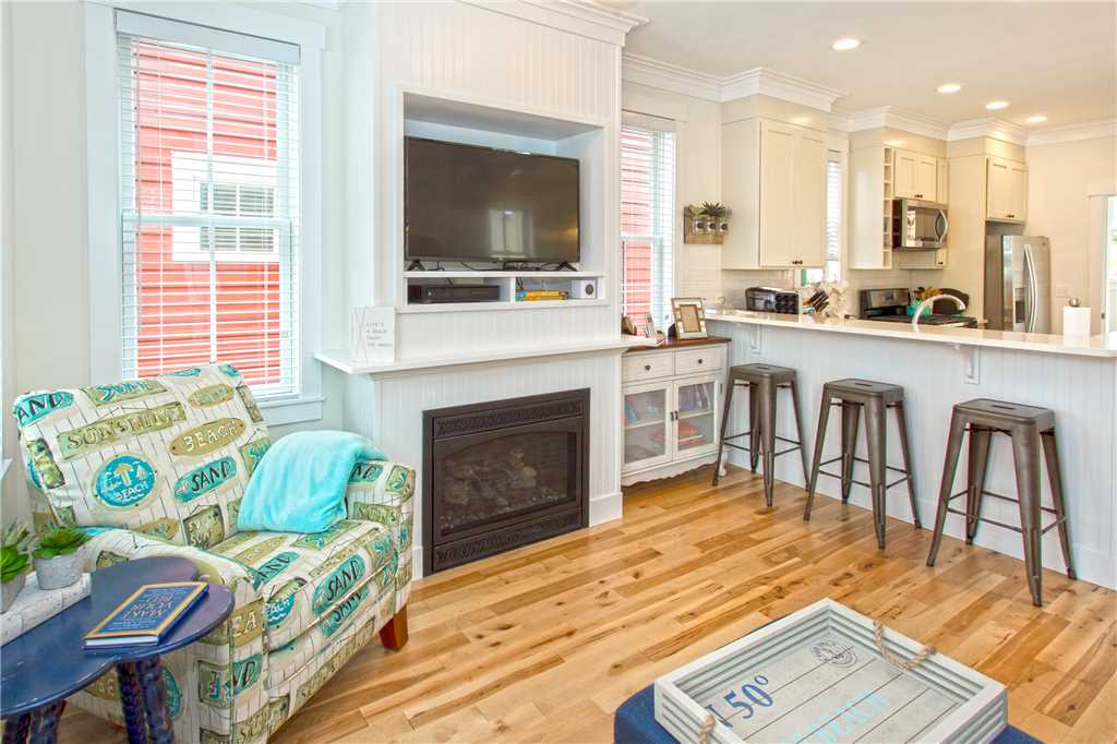 Living room with fireplace and TV